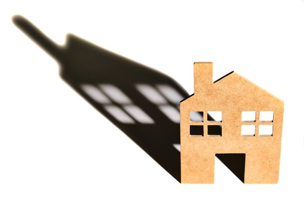 new house frame casting shadow